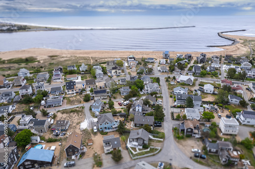 aerial view of the river at a beach with homes
