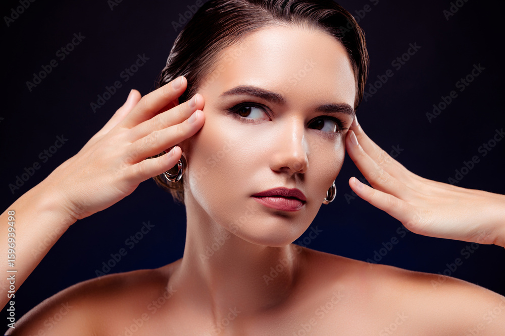 Fototapeta premium Photo portrait of attractive young woman touch skin temples lifting shoulders off isolated on black color background