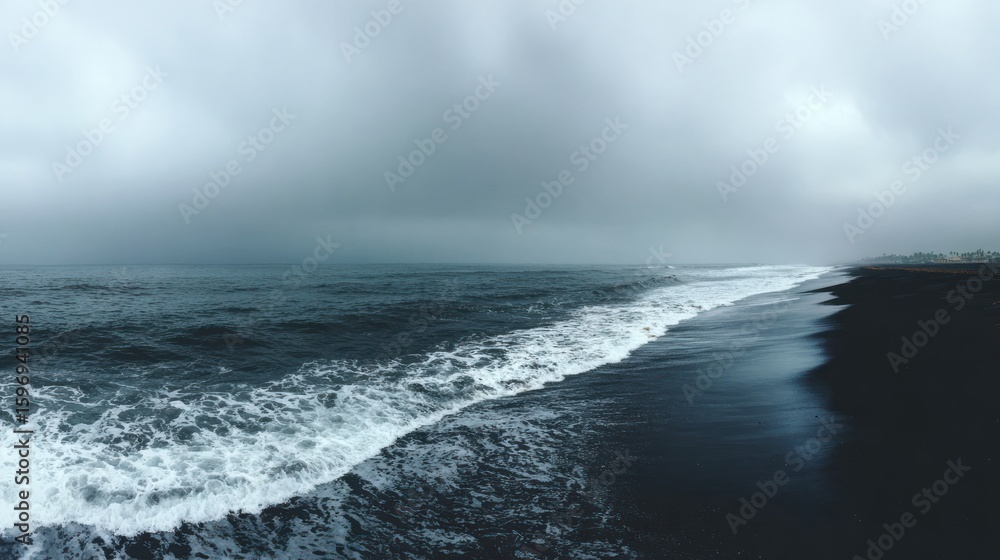Fototapeta premium Dark beach scene under a moody sky