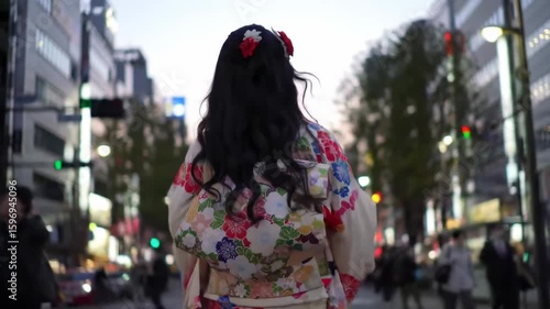 Woman in traditional clothing on city street