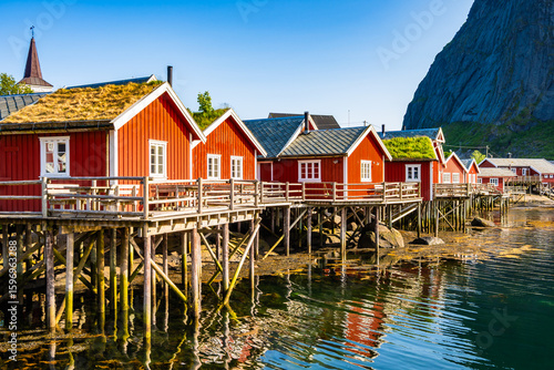 Canvas Print Red traditional type houses used by fishermen's in Reine village on Moskenesoy i