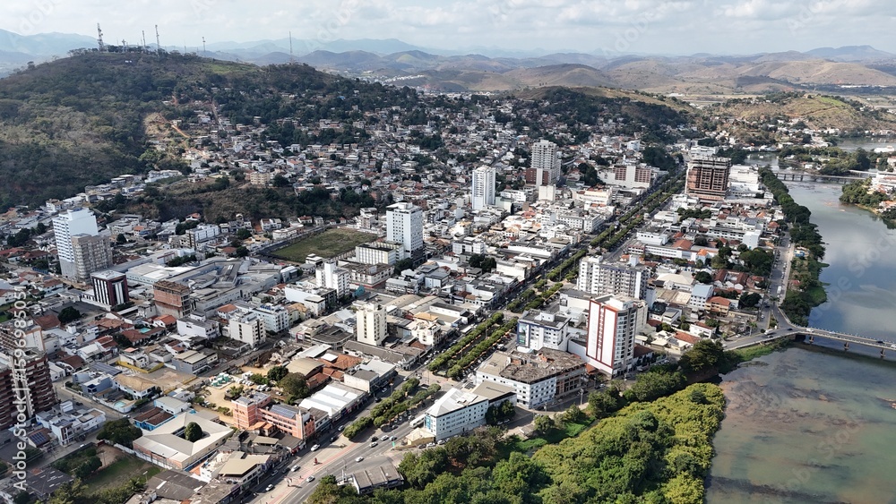 Fototapeta premium Itaperuna-RJ; Itaperuna; Interior RJ; BR 356; Av. Cardoso Moreira; Rio Muriaé; Centro de Itaperuna; Ponte Itaperuna RJ; Drone Itaperuna RJ; Concha acústica Itaperuna RJ.