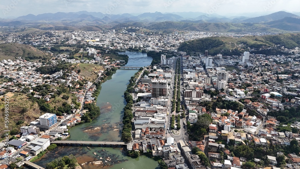 Fototapeta premium Itaperuna-RJ; Itaperuna; Interior RJ; BR 356; Av. Cardoso Moreira; Rio Muriaé; Centro de Itaperuna; Ponte Itaperuna RJ; Drone Itaperuna RJ; Concha acústica Itaperuna RJ.