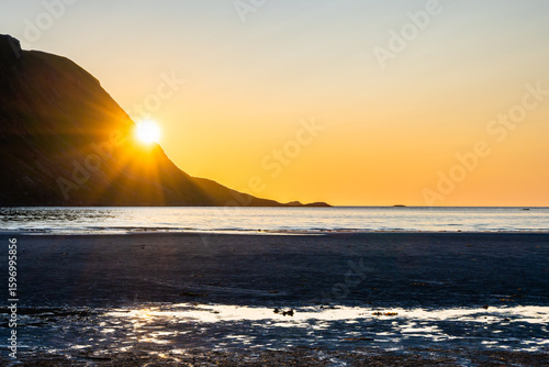 Wallpaper Mural Midnight sun on sandy Yttersand beach near Fredvang village on Moskenesoy island in summer, Lofoten Islands, Norway Torontodigital.ca