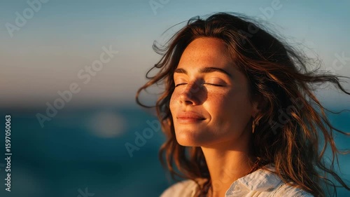 Peaceful Woman Embracing Sunset Breeze by the Ocean Shore








Ask ChatGPT