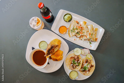 Mexican Dinner Feast, Cheese Quesadilla, Birria Pork Rice Burritos, Pork Carnitas Tacos With Soda and Cocktail Drinks