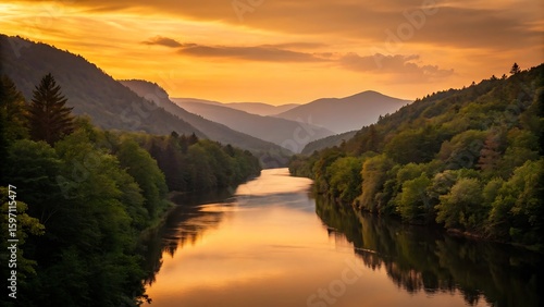 Serene river valley bathed in golden sunset light