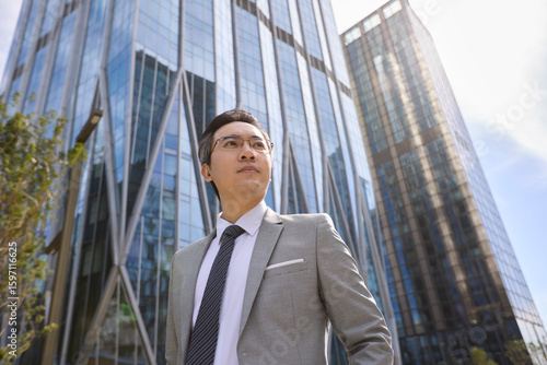 Wallpaper Mural Mature businessman looking afar Torontodigital.ca