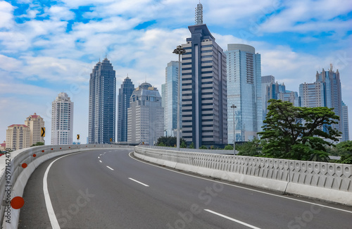 jakarta city modern buildings with quiet road and fresh air in the morning