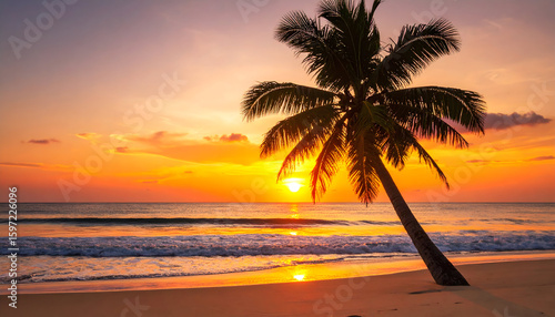 Fototapeta Naklejka Na Ścianę i Meble -  Golden hour at tropical beach with palm tree silhouette and ocean waves