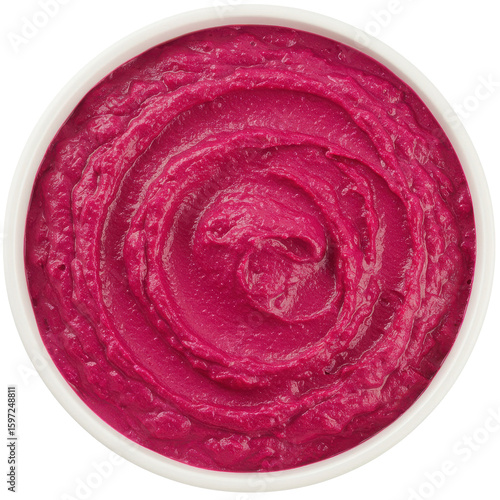 Vibrant pink hummus in a round bowl with a smooth swirl, set against a neutral background