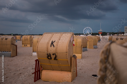 Beach at Luebeck Travemuende with Ferris wheel