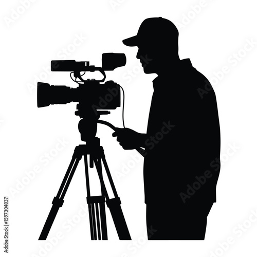 Filmmaker silhouette operating professional video camera on tripod