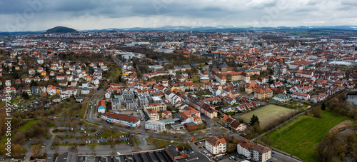  Aerial view of the old town of the city Fulda on a cloudy noon in autumn in Germany.
