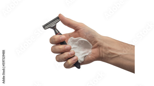 Close-up of a Man's Hand Holding a Razor and Shaving Cream