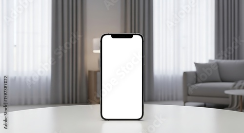 Modern smartphone mockup on a white table set against a neutral, elegant living room background.