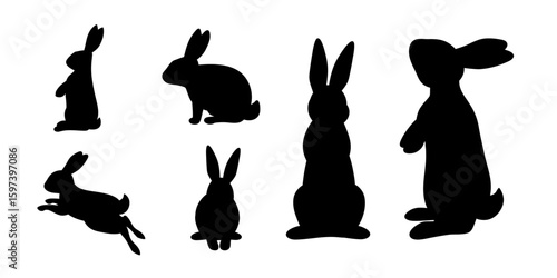 Vector set of rabbit silhouettes in sitting, standing, running and jumping poses for Easter decoration or animal design graphics.