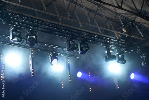 Photography Stage with bright concert lighting, spotlights and smoke effects prepared for live music performance