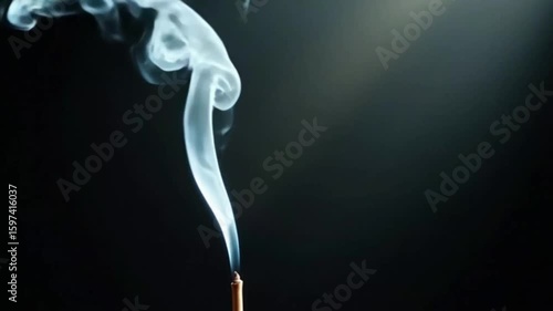 Real-time smoke from incense stick drifting in side-light beam