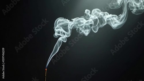 Real-time smoke from incense stick drifting in side-light beam