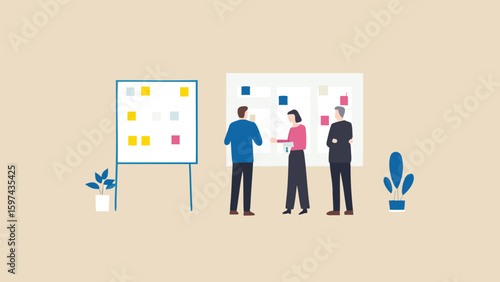 Three people standing in front of two whiteboards with colorful sticky notes displayed on them nicely