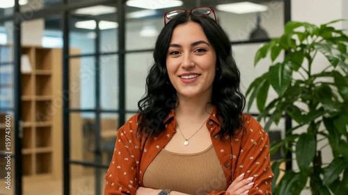 Portrait of a woman with glasses on her head in an office environment hd , 4k , mp4 video