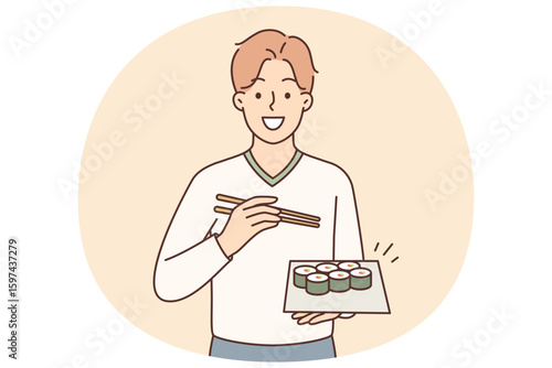 Man holding plate of maki rolls invites to dine in japanese restaurant with delicious healthy food