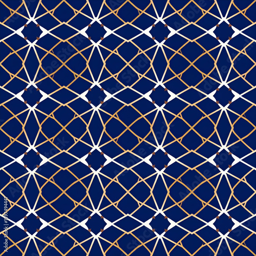 A geometric pattern featuring interwoven lines in gold and white on a navy background.