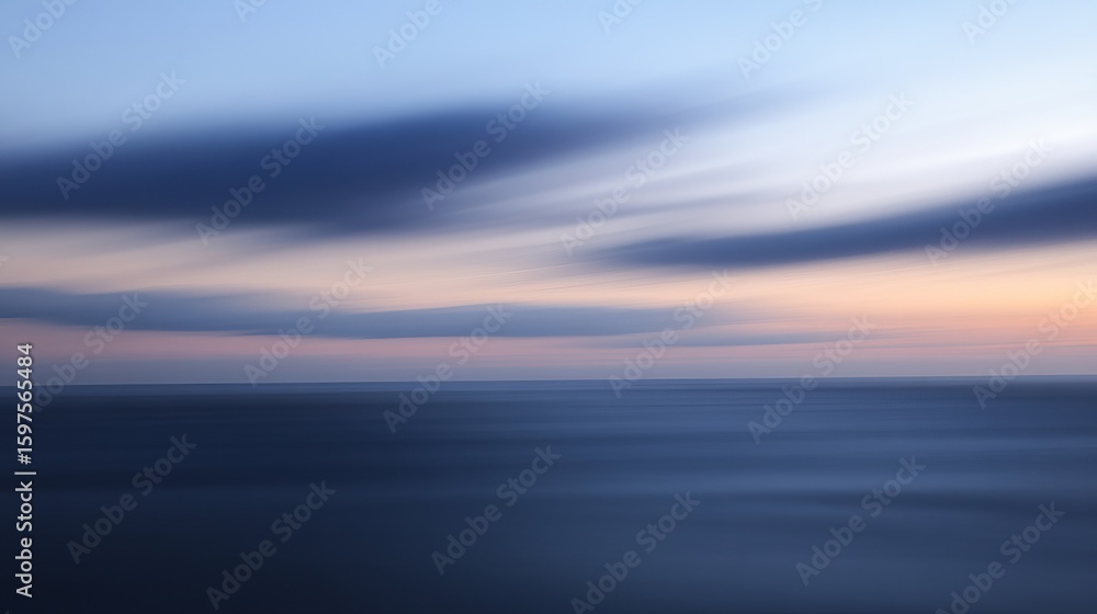 Fototapeta premium Blurry sunset over calm water