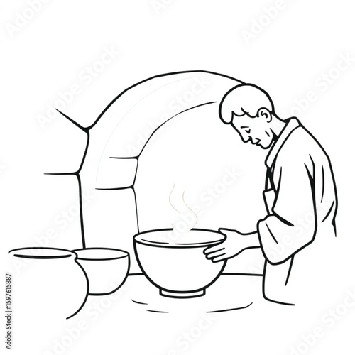 A potter loading bowls into a glowing kiln for firing