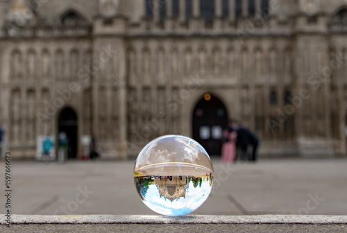 A Cathedral as seen through a lens ball. Unique picture of this religious building.