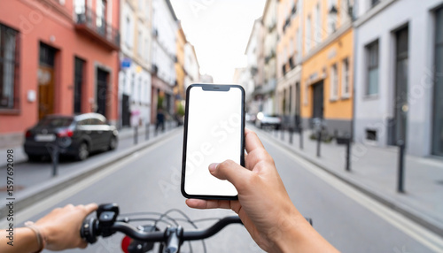 Cyclist's POV: Hands Holding Phone with Blank Screen on City Street