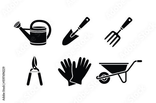 Gardening tools including watering can trowel fork pruners gloves and wheelbarrow