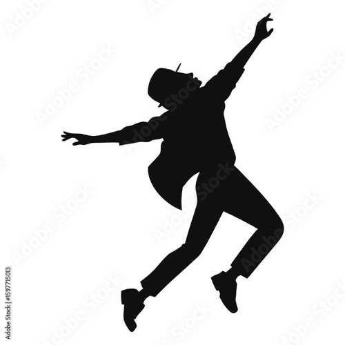 silhouette of male dancer stylized pose jumping with arms outstretched