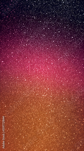 Colorful starry night sky with vibrant gradients blending purple and orange tones above a dark horizon