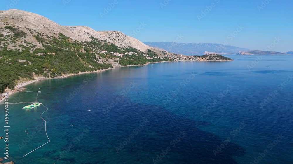 Campsite at Campig Skrila, Krk Island, Stara Baska Croatia, Aerial View of the Mountains and Coast With Boats, Beaches and Adriatic Sea. The Seaside Rv Campmobiles on a Summer Beautiful Coastline Campsite at Campig Skrila, Krk Island, Stara Baska Croatia, Aerial View of the Mountains and Coast With Boats, Beaches and Adriatic Sea. The Seaside Rv Campmobiles on a Summer Beautiful Coastline