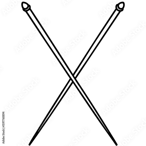 Crossed double pointed knitting needles on white double pointed needles craft