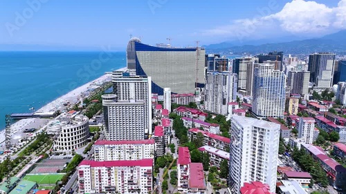 Batumi Coastline with Modern Skyscrapers and Beach on a Sunny Summer Day