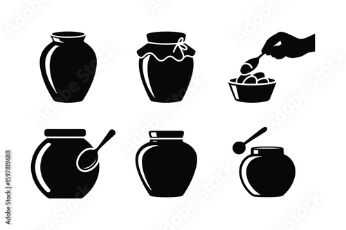 Jars and spoons with food items bowl hand
