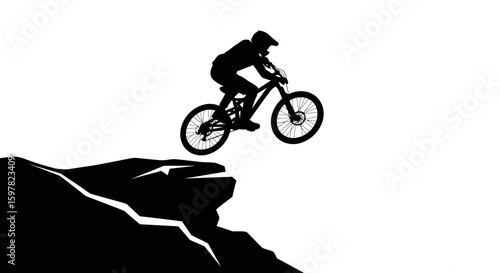 Mountain Biker Mid-Jump Over Ledge