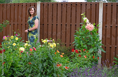 Photography Woman with flowers in garden