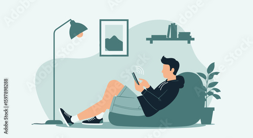 Young Man Relaxes On A Beanbag Chair At Home Using His Smartphone