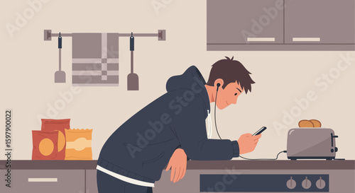 Teenager Relaxing In The Kitchen While Texting On A Mobile Phone And Listening Music