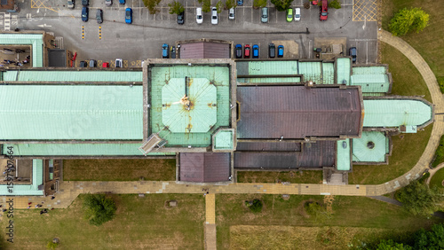 Wallpaper Mural Aerial view of the Guildford Cathedral's weathered copper roofs and geometric designs, a testament to architectural grandeur, Guildford, England, United Kingdom. Torontodigital.ca