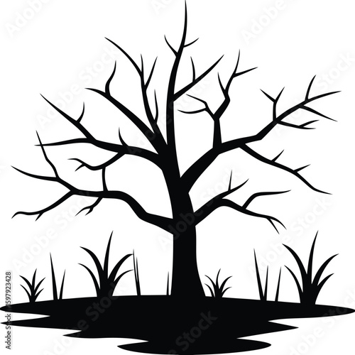 The Silhouette of a Dead Tree in a Swamp