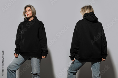 Confident Woman Wearing Oversized Black Hoodie with Blank Space for Mockup