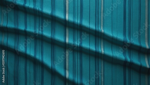 Wallpaper Mural Blue striped fabric with shadows and folds. Textile pattern and material. Fabric and textile design. The concept of fabric texture and textile technology. Torontodigital.ca