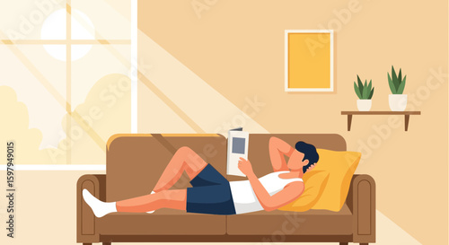 Man Relaxing On Couch Reading Book During Leisure Time Indoor Scene