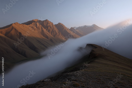in soft twilight of early morning serene ridge line in afghanistan reveals enchanting seasonal transition