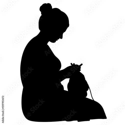 Silhouette of woman knitting with yarn and needles in black and white. This silhouette depicts someone absorbed in needlework, engaged in creating something with their hands.